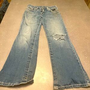 Blue Jeans True Religion hole wide leg low rise